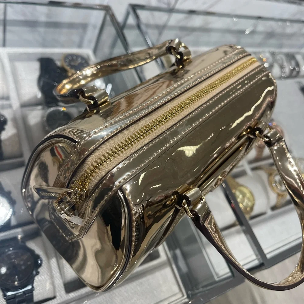 MICHAEL KORS Jet Set Small Metallic Convertible Crossbody Duffle Xbody
Pale Gold - Picture 13 of 16